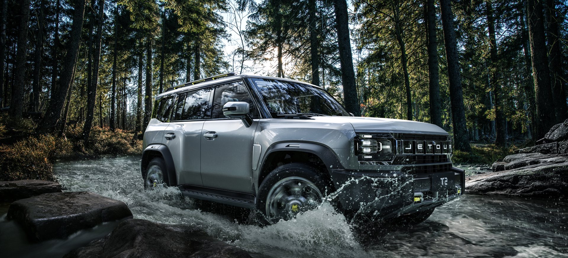 Jetour T2 crossing a forest stream