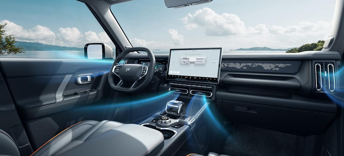 Jetour T1 i-DM interior with touchscreen display and ocean view background