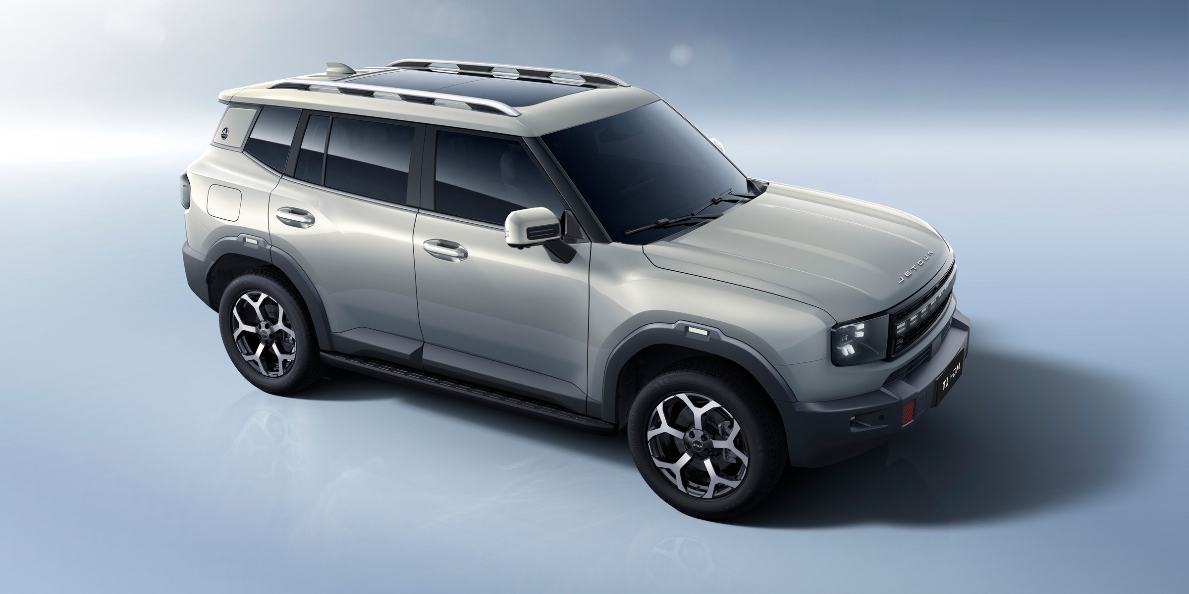 Front right three-quarter exterior view of the rugged Jetour T1-iDM plug-in hybrid SUV